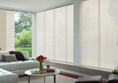 A living room with white Panel Glides