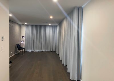 Full length S Fold curtains in living room.