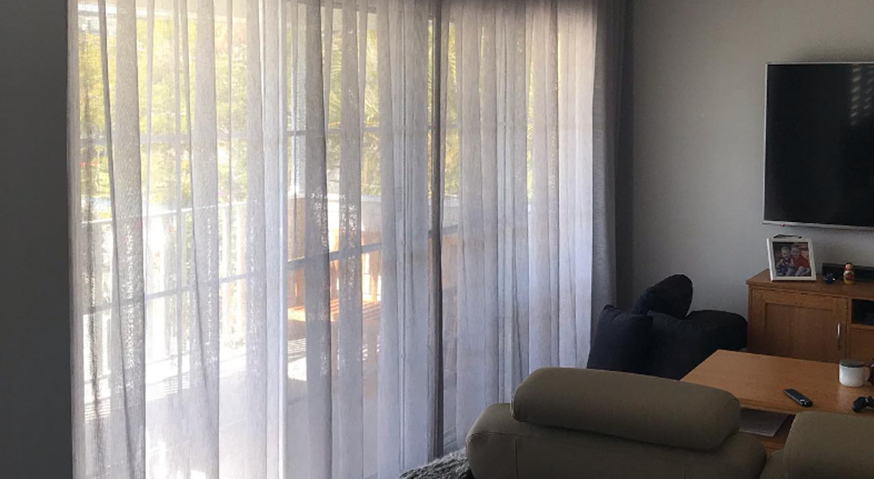 Sheer curtains in a contemporary living room