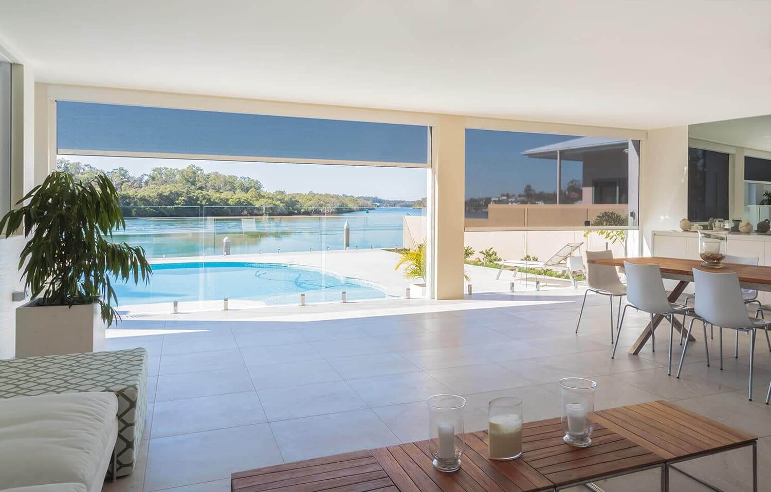 Zipscreen-protection-and-comfort-flip-compress A living room with white Panel Glides